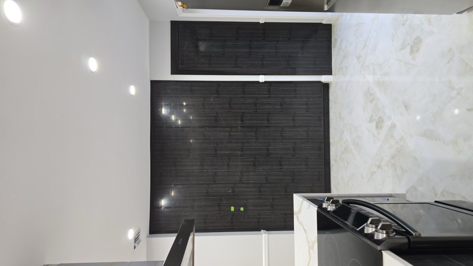 Floor-to-ceiling storage by Innovate Contractor