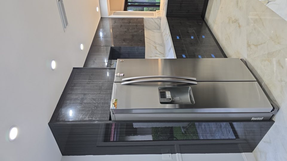 Tall cabinet installation by Innovate Contractor