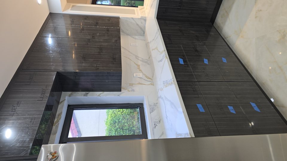 Counter and backsplash by Innovate Contractor